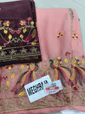 Peach saree with peacock embroidery and dark contrast fabric