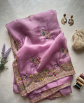 Lavender saree with colourful peacock embroidery and gold-tone border