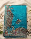Turquoise peacock embroidered saree